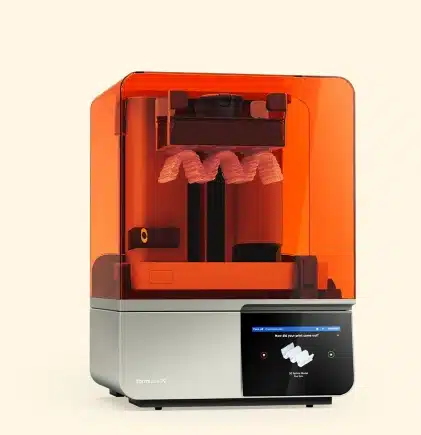Advanced dental 3D printer creating precise teeth models using digital dentistry technology in Carthage