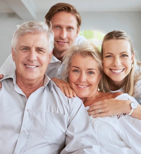 Happy family smiling after general dentistry visit in Carthage with preventive dental care and routine checkups